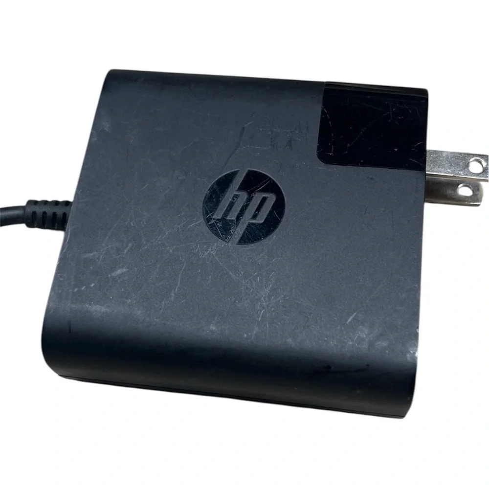 HP 65W Smart AC Power Adapter with a 4.5mm blue tip connector